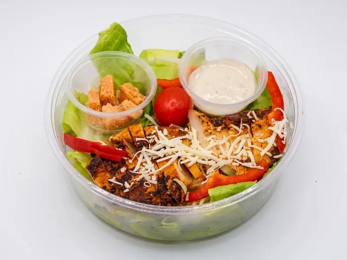 Chicken Caesar Salad — Healthy Version, Olaya, Al Khobar Grilled chicken Caesar salad with croutons, parmesan and ranch dip