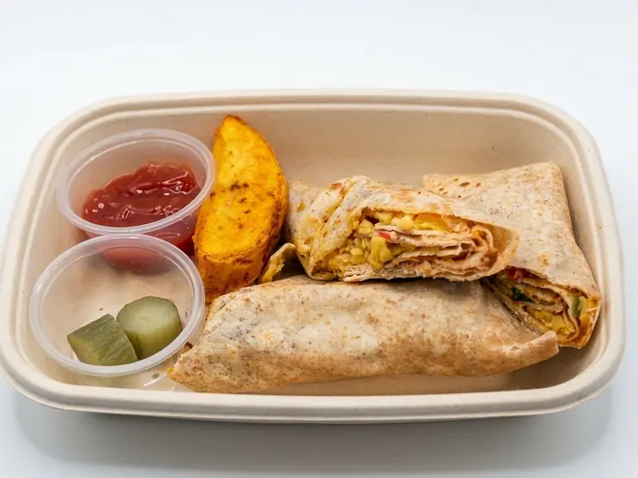 Egg Sandwich — Healthy Version, Olaya, Al Khobar Egg sandwich wraps with a potato wedge, pickles and ketchup