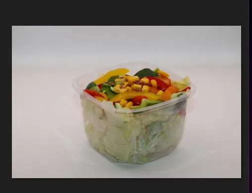 Garden salad cup with lettuce, corn and mixed vegetables